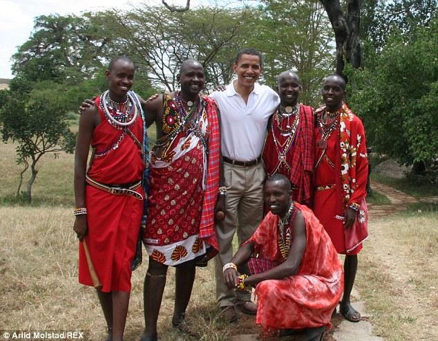 Barack Obama standing in the middle of five Maasai in Masai Mara, Kenya, Africa.
